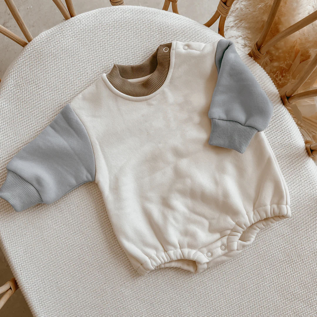 Pink Cozy Cub Baby Class A Romper for 0 months, featuring soft, premium outerwear fabric and long sleeves for comfort.