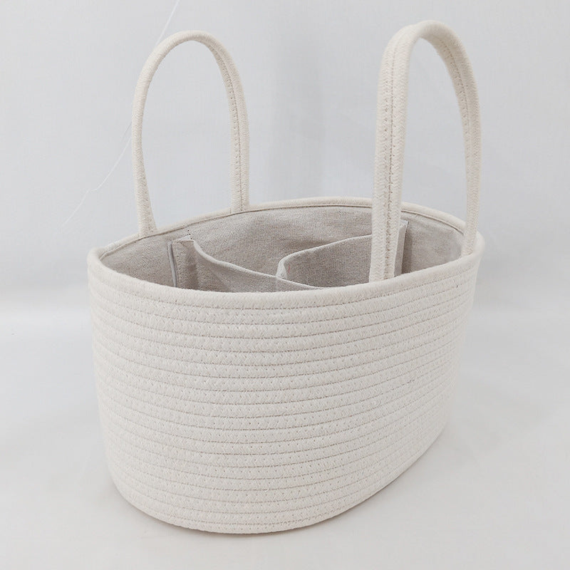 Cozy Cub cotton rope diaper caddy organizer for nursery changing table, with compartments for baby essentials and storage.