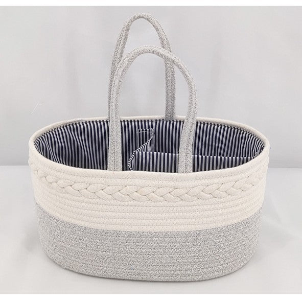 Cozy Cub Cotton Rope Diaper Caddy Organizer for nursery, with handles and compartments for baby essentials on changing table.