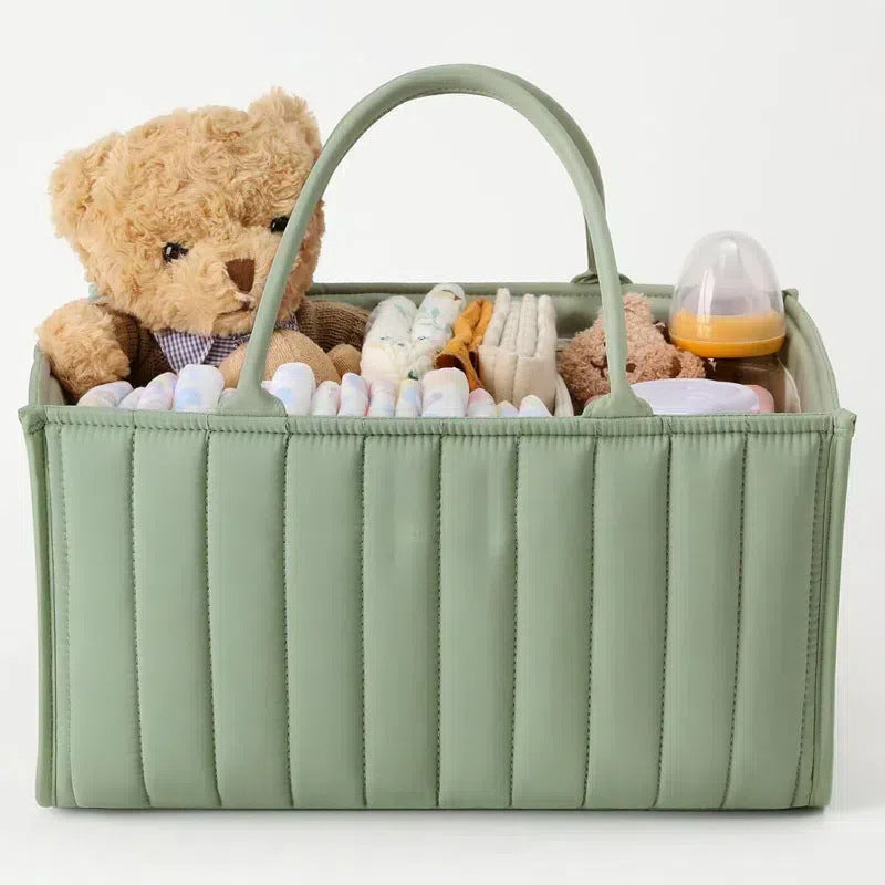 Cozy Cub green diaper caddy storage basket for newborn essentials, stylish organizer for baby care and diaper supplies.