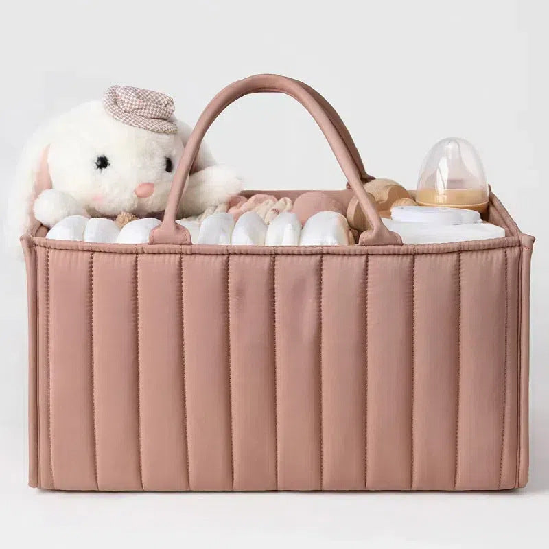 Green Cozy Cub Stylish Diaper Caddy Storage Basket for newborn essentials, organizer for baby diapers and supplies.