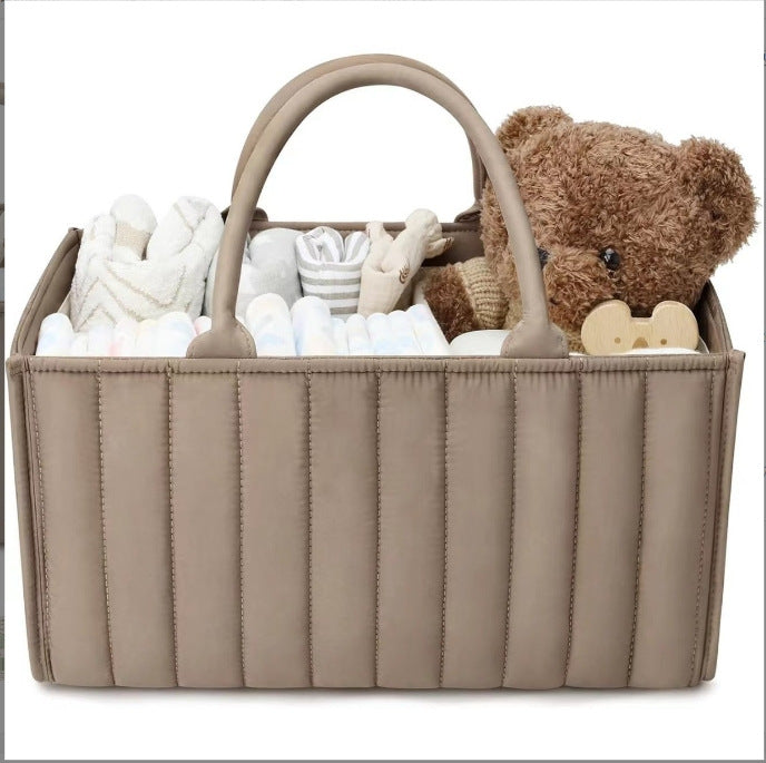 Green Cozy Cub Stylish Diaper Caddy Storage Basket for newborn essentials, organizer for baby changing and diaper supplies.