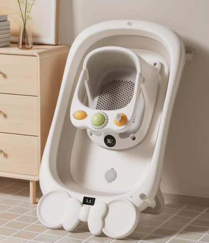 Cozy Cub baby bath seat with non-slip suction cups and temperature display, designed for safe, comfortable bathing.
