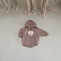 Cozy Cub brown baby sweater bodysuit, cute knit one-piece romper for infants, made of soft cozy fabric, perfect for little ones.