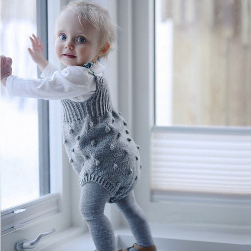 Gray Cozy Cub knitted baby sweater romper, cozy warm one-piece apparel for infants, featuring soft knit fabric and comfortable fit.