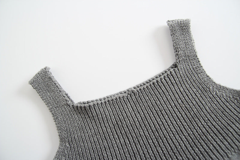 Gray Cozy Cub knitted baby sweater romper, a cozy warm one-piece apparel for infants, featuring soft knit fabric and comfortable fit.