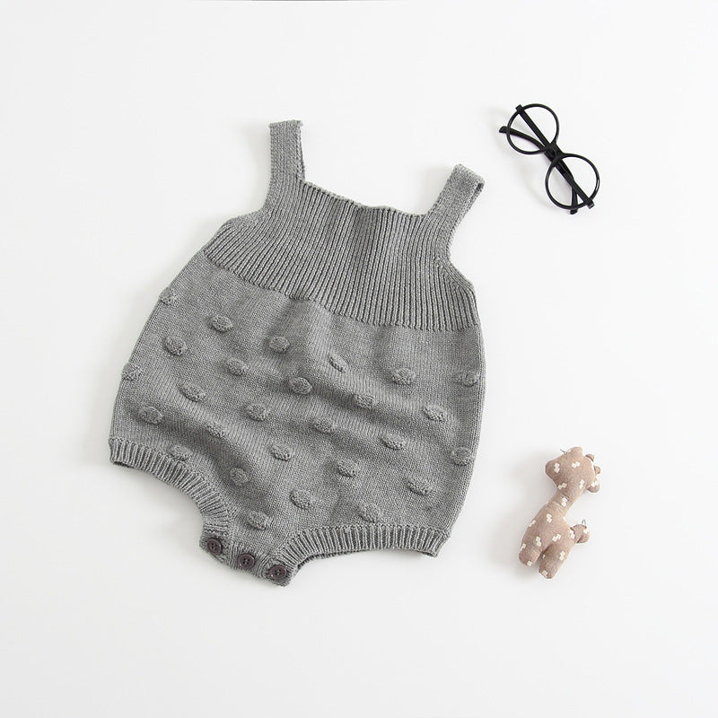 Grey knitted baby sweater romper by Cozy Cub, cozy warm one-piece apparel for infants, soft and comfortable for little ones.