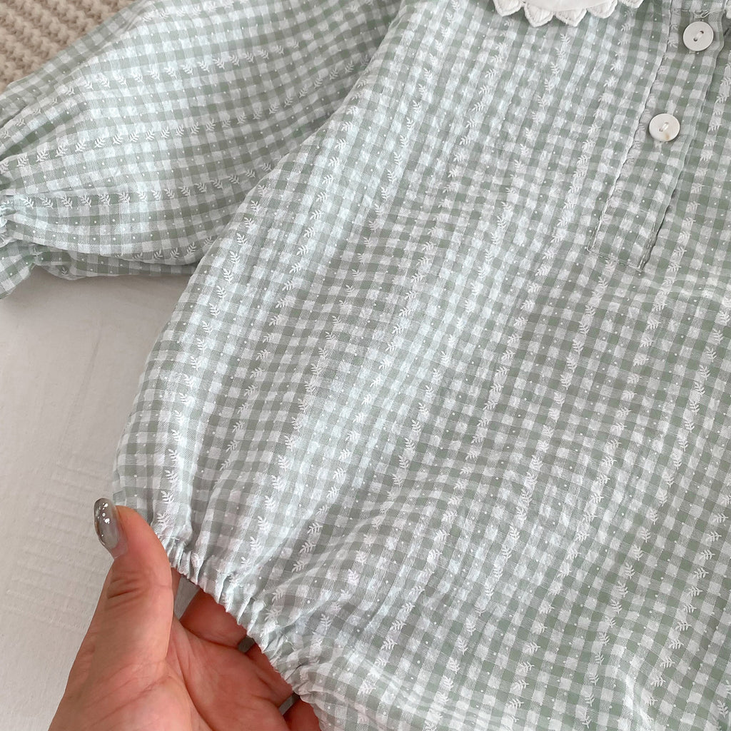 Light green Cozy Cub baby girl doll collar romper with long sleeves and bottom coverage, displayed on a doll.