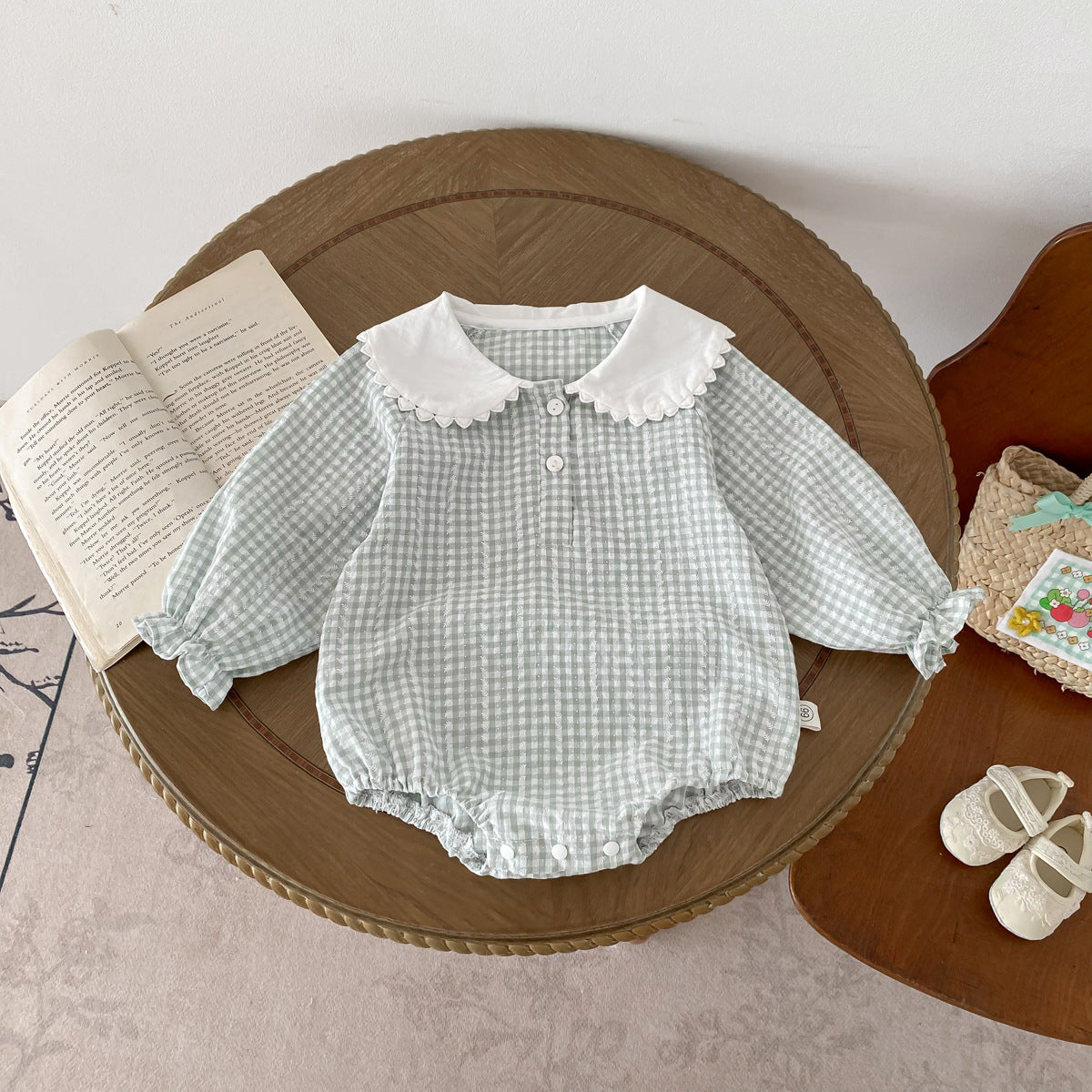 Light green Cozy Cub baby girl doll collar romper with long sleeves and bottom cover, perfect for cute, comfortable toddler apparel.