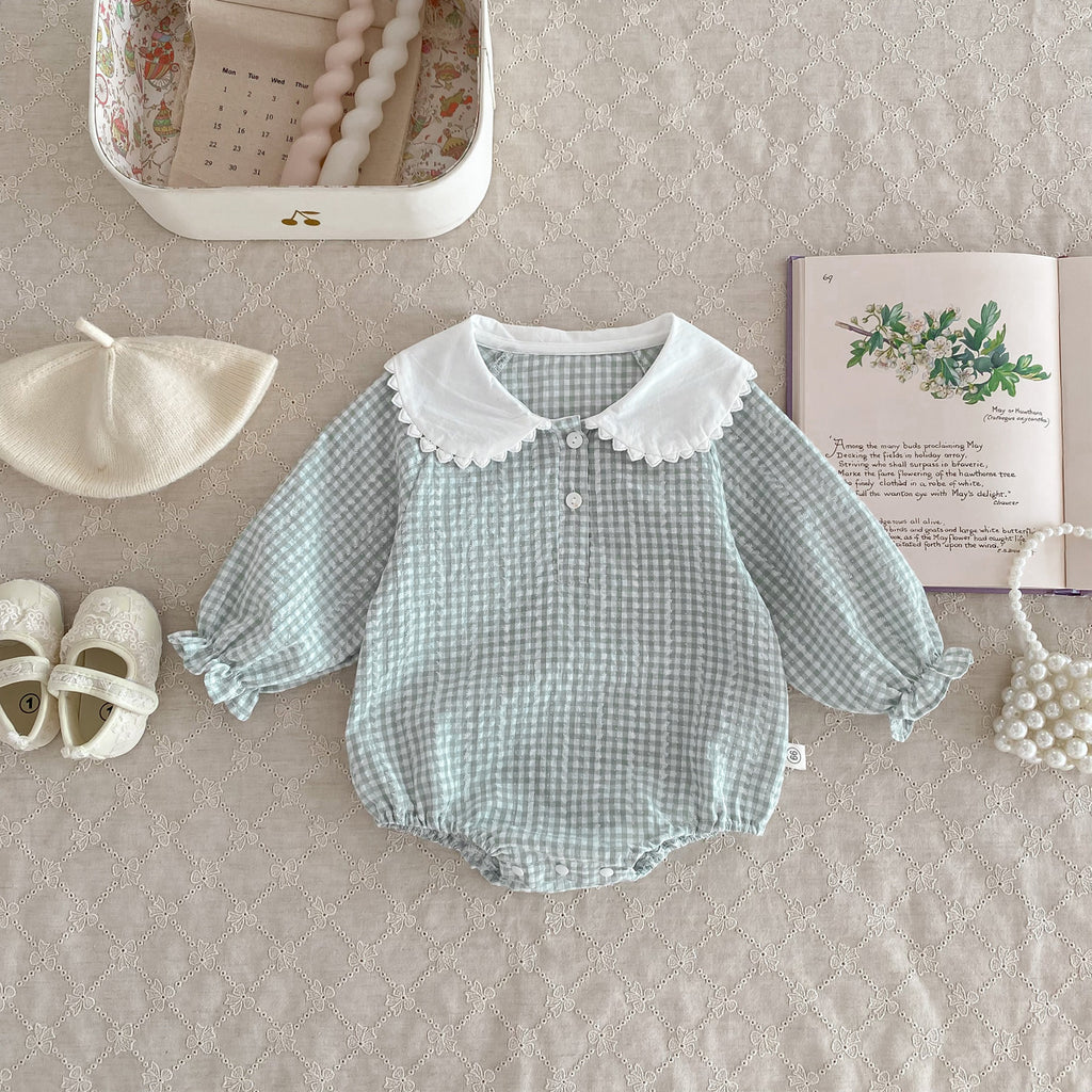 Light green Cozy Cub baby girl doll collar romper with long sleeves and bottom coverage, made of soft apparel fabric.