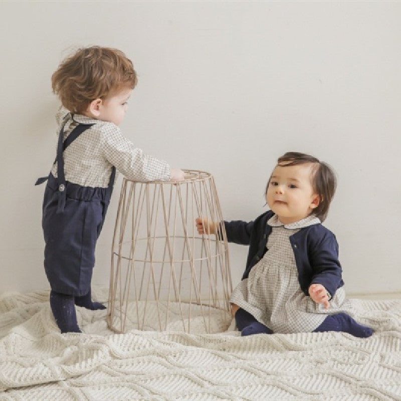 Cozy Cub baby romper jumpsuit, soft and comfortable one-piece outfit for infants, featuring cozy fabric and simple design.