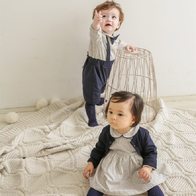 Cozy Cub baby romper jumpsuit in soft, comfortable fabric, featuring a one-piece design perfect for everyday wear.