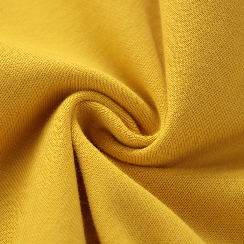 Yellow Cozy Cub baby romper featuring a dapper gentleman style, perfect for a cute little one-piece outfit.