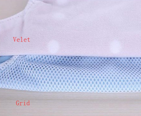 Yellow Cozy Cub newborn baby romper made of soft, gentle fabric, featuring a cozy one-piece design for newborns.