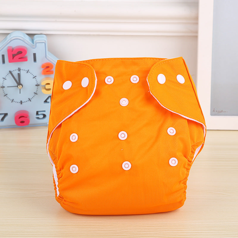 Yellow Cozy Cub newborn baby romper made of soft, gentle fabric, featuring a cozy one-piece design ideal for newborns.