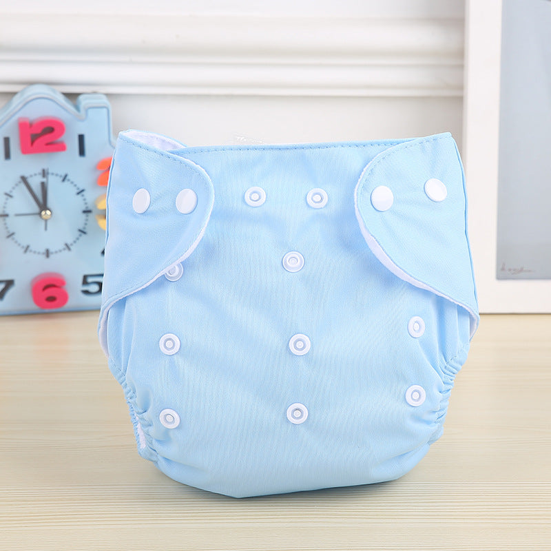Yellow Cozy Cub newborn baby romper, soft and gentle one-piece apparel for infants, featuring a cozy grid pattern.