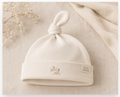 Soft knit Cozy Cub Baby Beanie Hat for newborns and infants, cozy baby accessories perfect for keeping little heads warm.