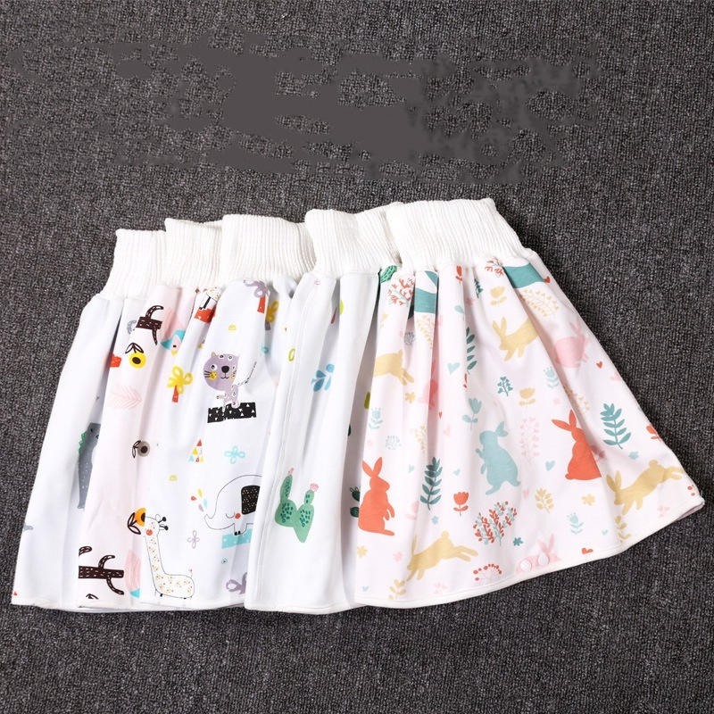Cute Cozy Cub Baby Diaper Skirt for girls with layered design, soft fabric, and adorable animal party print.