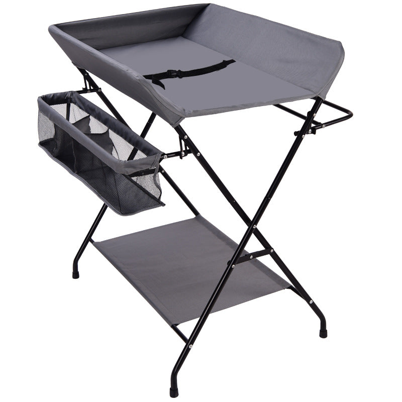 Dark grey Cozy Cub foldable baby diaper changing table, portable and compact baby furniture for easy diaper changes.