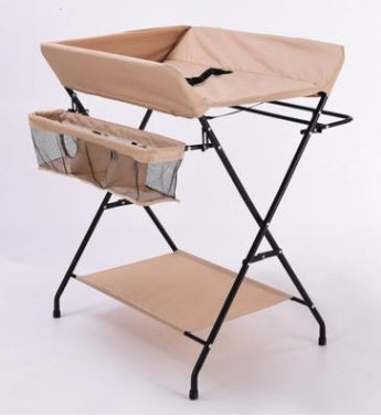 Dark grey Cozy Cub foldable baby diaper changing table, portable and compact baby furniture for convenient diaper changes.