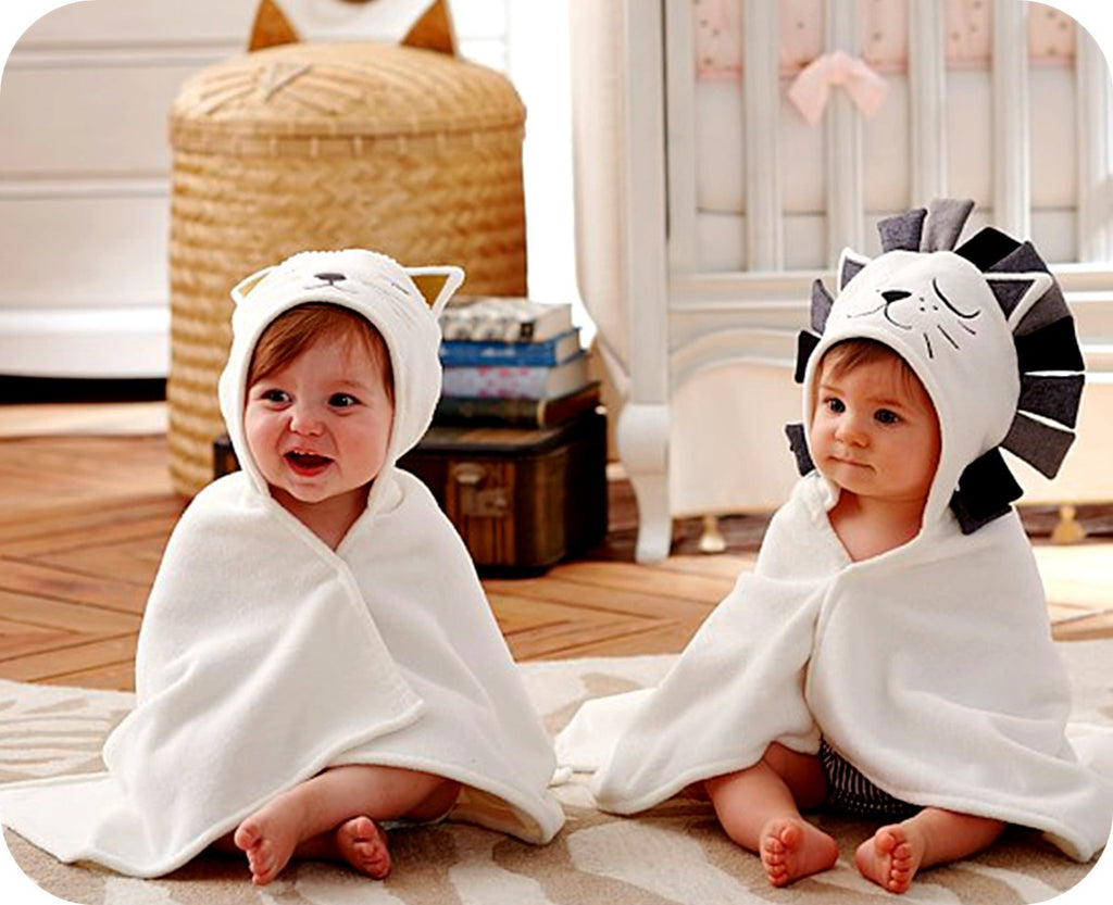 Cozy Cub baby hooded bath towel featuring an elephant design, soft wrap blanket perfect for newborns' bath time.