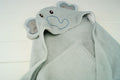 Cozy Cub baby hooded bath towel with elephant design, soft wrap blanket for newborns, perfect for bath time comfort and warmth.