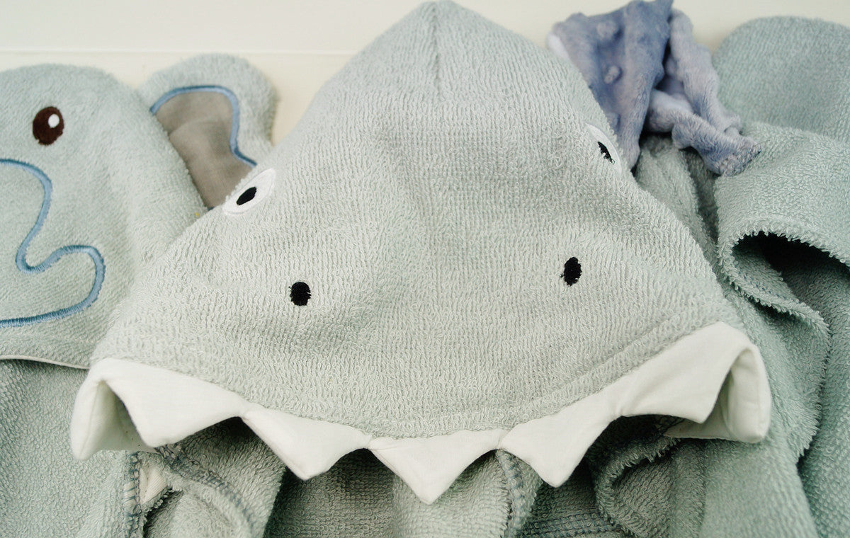 Soft Cozy Cub baby hooded bath towel featuring an elephant design, perfect for wrapping newborns after bath time.