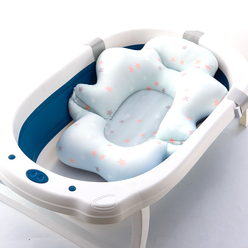Cozy Cub baby bath mat in orange with non-slip safety surface, designed for infant tubs to prevent slipping during bath time.