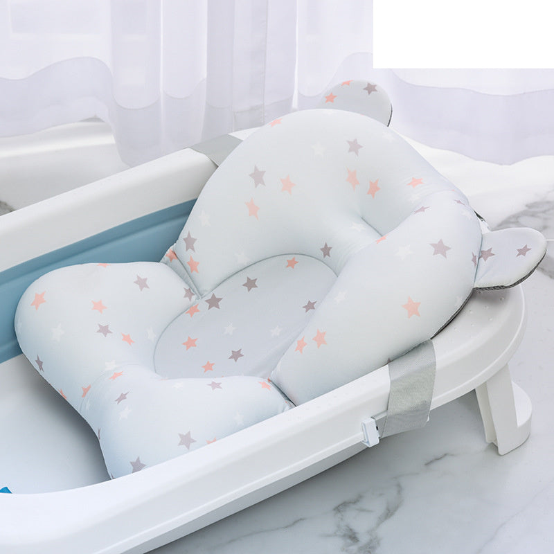 Cozy Cub baby bath mat in orange with pig design, non-slip safety mat for infant tubs, soft and secure for bathing infants.