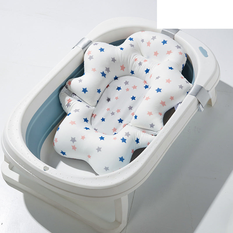 Orange Cozy Cub baby bath mat with non-slip safety surface, designed for infant tubs to prevent slipping during bath time.