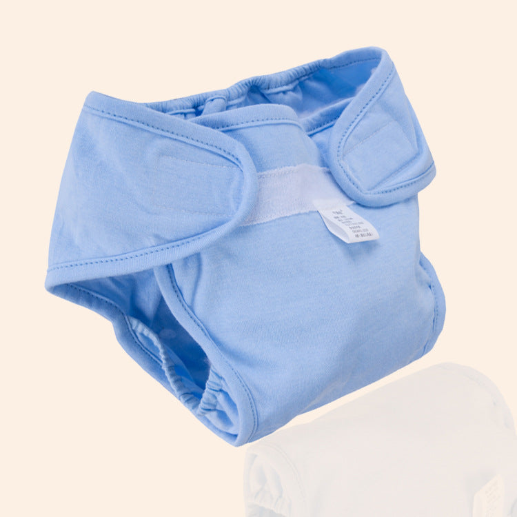 Blue Cozy Cub cloth diaper pants for babies, soft reusable training pants with stretchy waistband and comfortable fit.