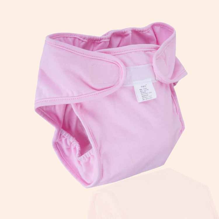 Blue Cozy Cub cloth diaper pants for babies, soft reusable training pants with gentle elastic waist and comfortable fit.