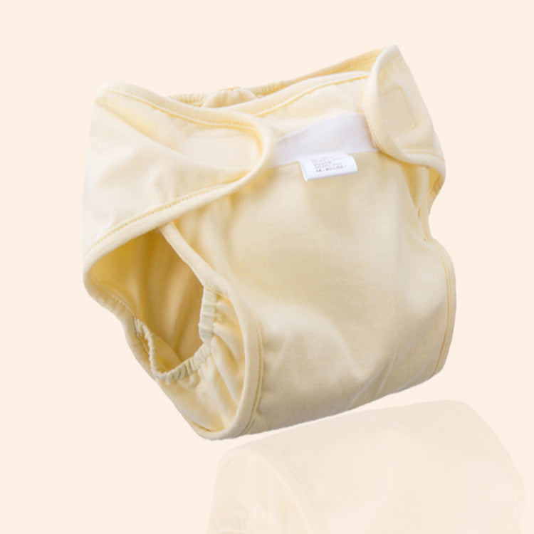 Blue Cozy Cub baby cloth diaper pants, soft reusable training pants for toddlers, designed for comfort and easy wear.