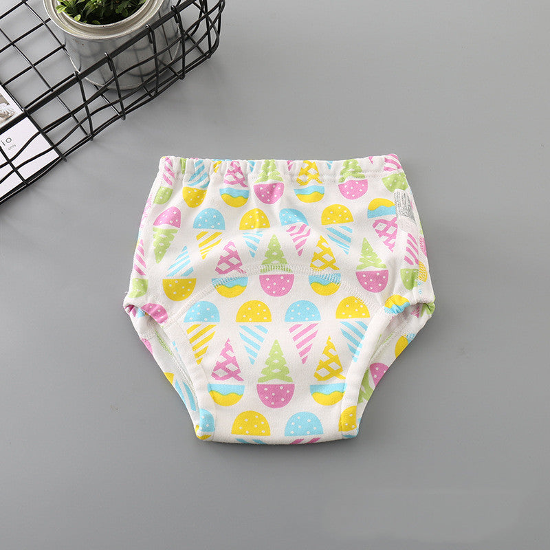 Cozy Cub newborn washable cotton cloth diaper with dinosaur print, soft and reusable for comfortable baby care.
