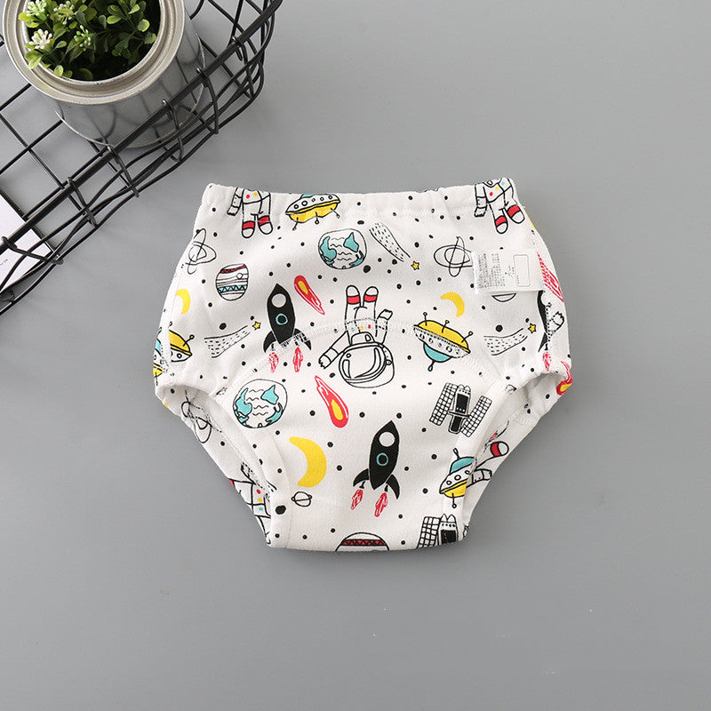 Cozy Cub newborn washable cotton cloth diaper with dinosaur print, soft and reusable for comfortable baby care.