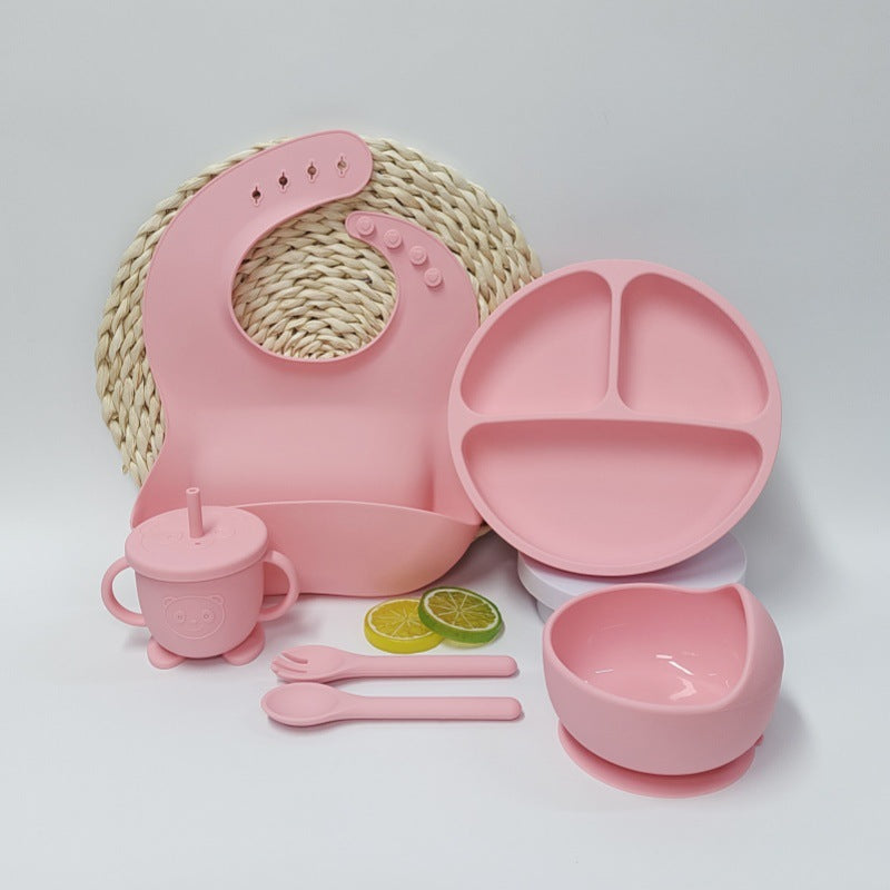 Beige Cozy Cub baby placemat and tableware set with silicone suction base for feeding, designed for easy use and clean-up.