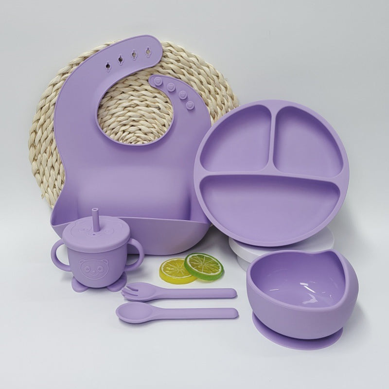 Beige Cozy Cub silicone baby placemat and tableware set with suction base for feeding, featuring a toddler-friendly design.