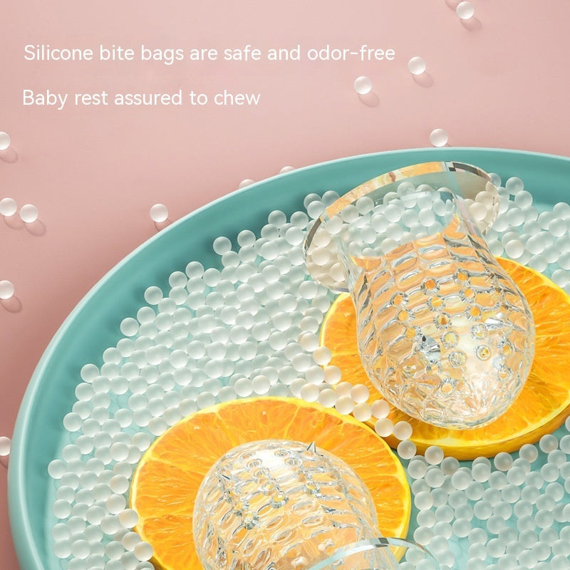 Cozy Cub Baby Fruit Feeder Teether with silicone mesh, molar rod, and pacifier in quiet blue for safe, soothing feeding.