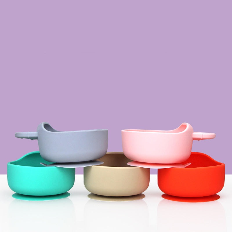 Cozy Cub baby feeding set with green silicone bowl and spoon, food grade 3-piece silicone baby bowl and spoon set.