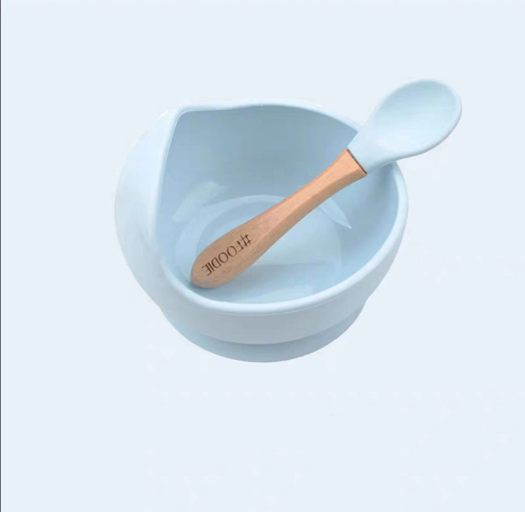 Light pink Cozy Cub silicone suction bowl set for babies, designed for feeding and complementary food dishes.