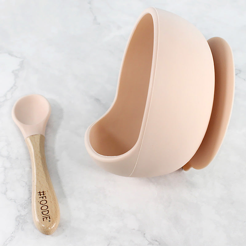 Cozy Cub silicone suction bowl set for babies, light pink feeding dishes with secure suction bases for complementary food.
