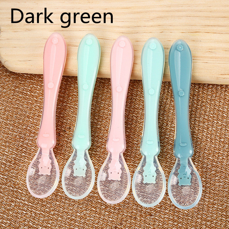 Pink Cozy Cub silicone baby spoon for soft infant feeding, featuring a comfortable handle and durable, safe feeding tableware.