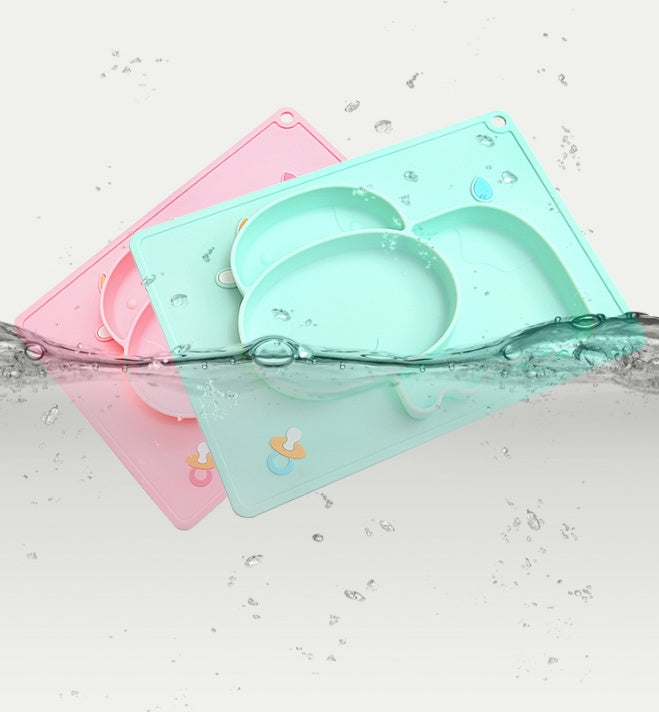 Cozy Cub cartoon pink silicone suction bowl for infants, designed for feeding and learning, with colorful cartoon characters on the dish.