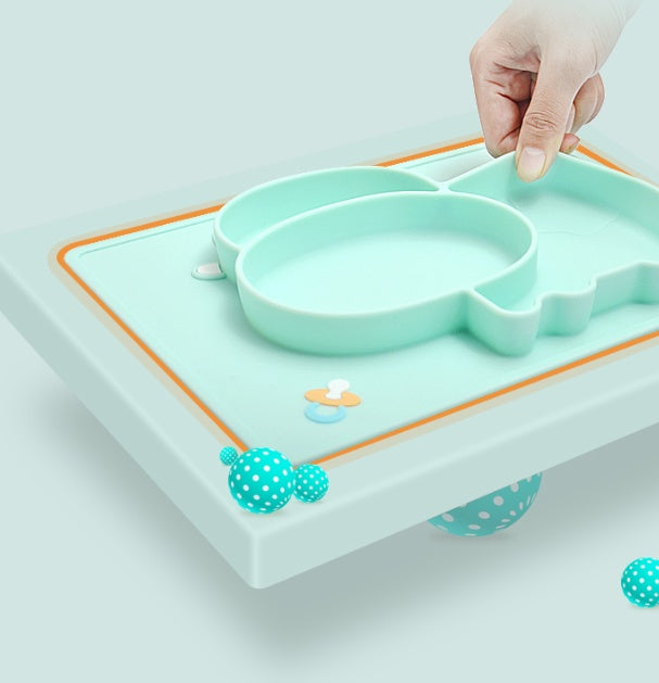 Pink Cozy Cub cartoon suction bowl for infants, silicone feeding dish with colorful design and secure suction base.