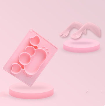 Pink Cozy Cub silicone suction bowl with cartoon design, ideal for infant feeding and learning, made for easy feeding and safety.