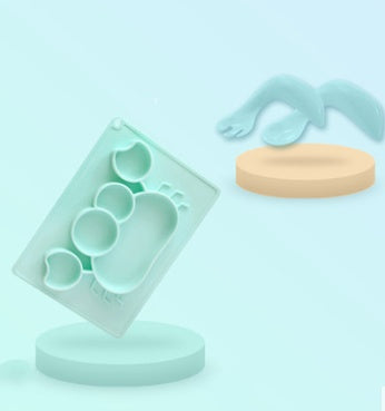 Pink Cozy Cub cartoon suction bowl for infants, silicone feeding dish with colorful design and secure grip for easy feeding.