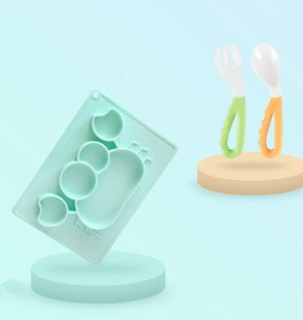 Pink Cozy Cub cartoon suction bowl for infants, silicone feeding dish with colorful design, ideal for baby learning and mealtime.
