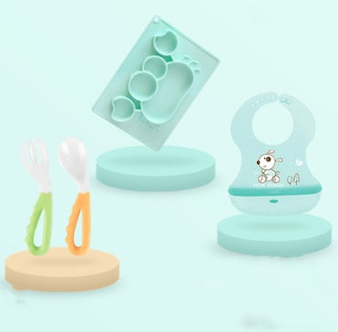 Pink Cozy Cub silicone suction bowl with cartoon design, ideal for infant feeding and learning to eat independently.