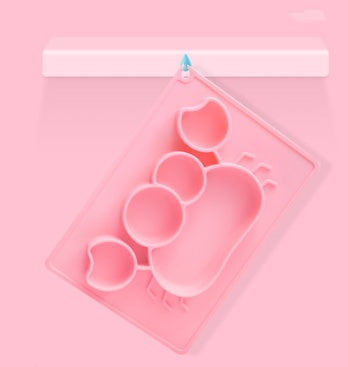 Pink Cozy Cub cartoon suction bowl made of silicone, designed for infant feeding, featuring a playful cartoon character on the dish.