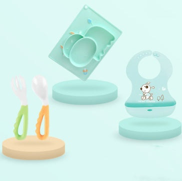 Pink Cozy Cub cartoon suction bowl for infants, silicone feeding dish with colorful design and secure suction base.